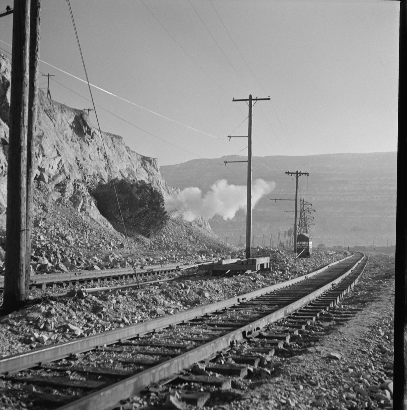 Blast at an open-pit copper mine, Bingham Canyon, 1942.