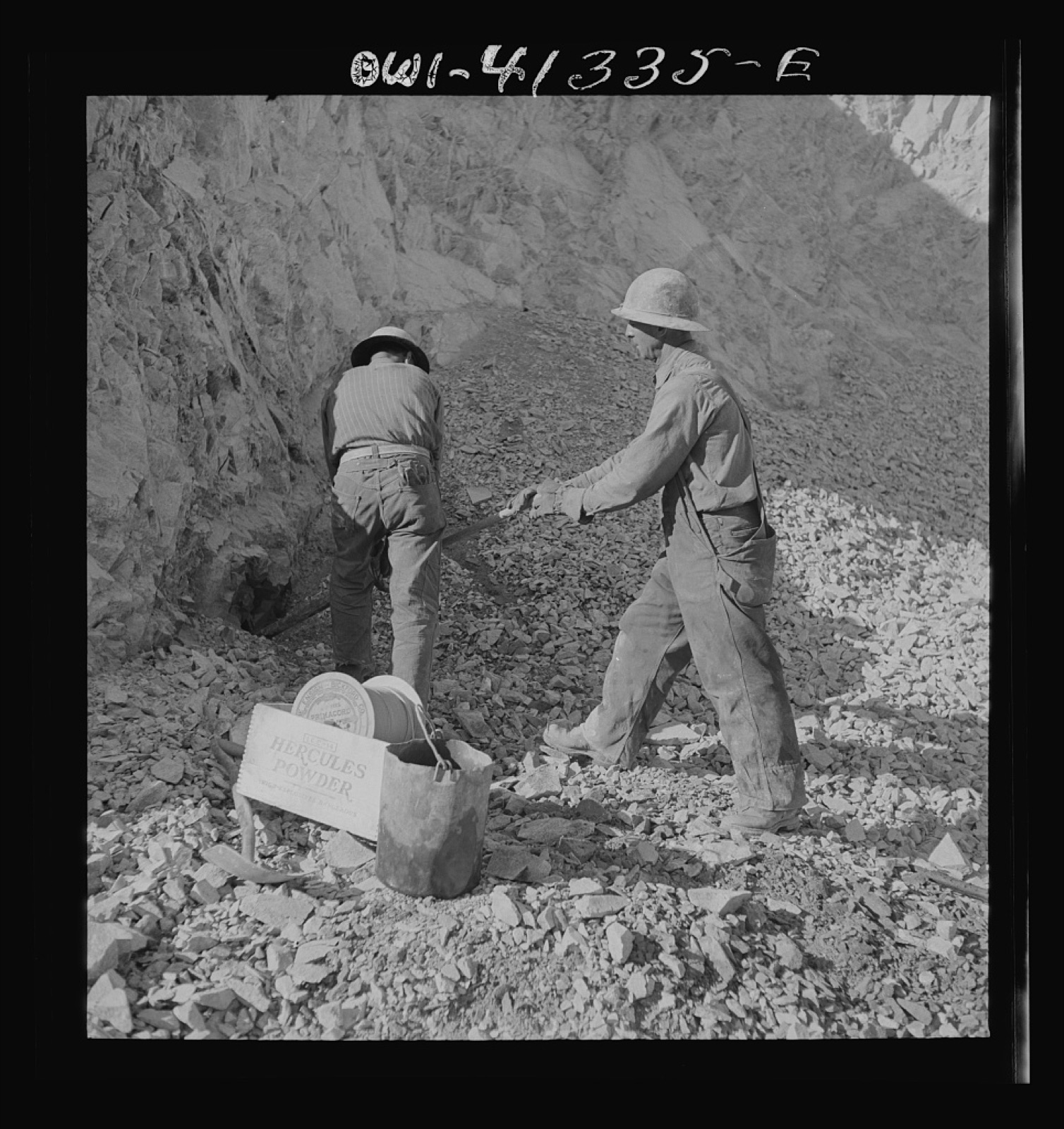Dust plume rising after a controlled mine blast.
